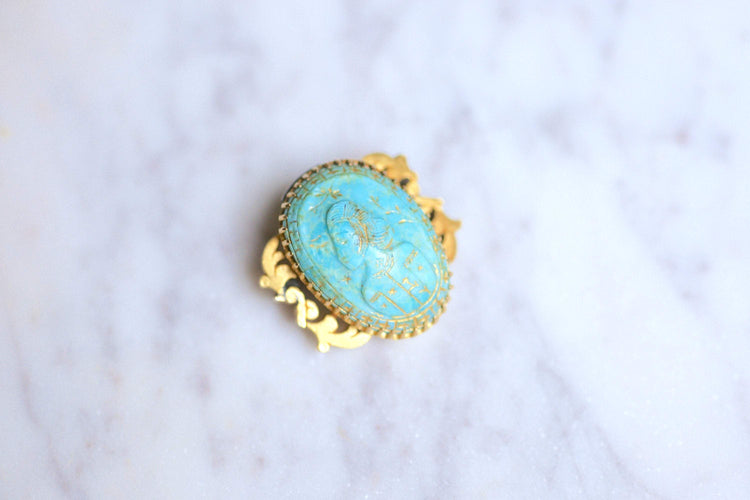 https://cdn.shopify.com/s/files/1/0075/4588/0666/products/broches-broche-ancienne-en-or-18kt-et-camee-turquoise-xixe-siecle-3.jpg?v=1613360426