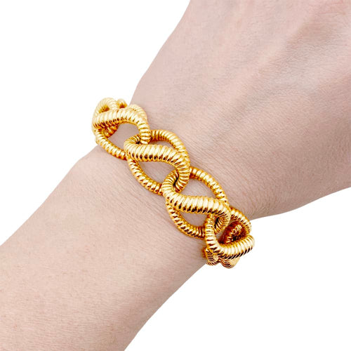 Bracelet Mellerio - Bracelet vintage à maillons torsadés en or jaune 18 carats 58 Facettes 35262