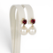 Boucles d'oreilles Boucles d'oreilles - Perles des mers du Sud, grenats et diamants en or jaune 58 Facettes E007