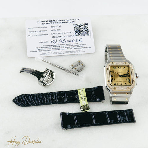 Cartier Santos Saat - 18K sarı altın ve çelikten unisex saat, pırlantalar 58 Facettes 2504