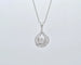 Collier Collier spirale arabe - Pendentif en or blanc 18 ct et diamants 2,60 ct 58 Facettes 8508