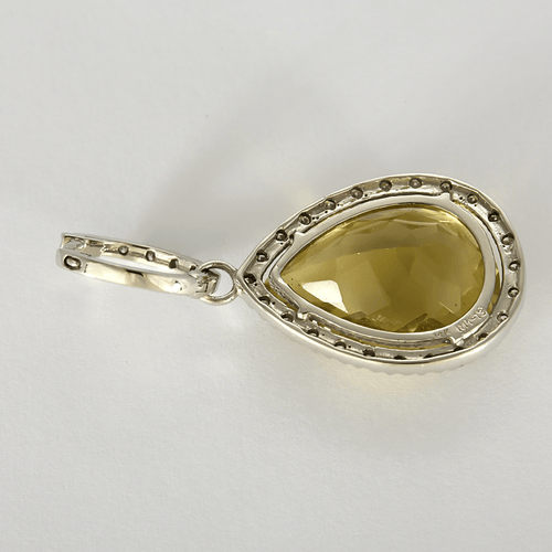 Boucles d'oreilles Paire de Pendants d'oreilles en or gris, quartz lemon et diamants 58 Facettes DV16843-14