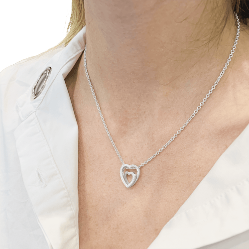 Collier Cartier Cœurs - Collier en or blanc et diamants 58 Facettes 34760