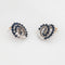 Boucles d'oreilles Boucles d'oreilles tourbillon diamants et saphirs en or blanc 14k 58 Facettes G14073