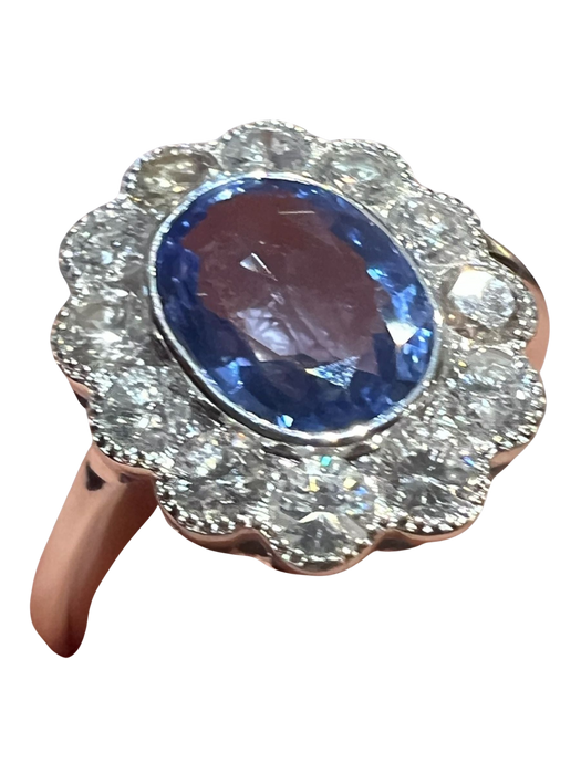 white gold ring with sapphire and brilliant surround