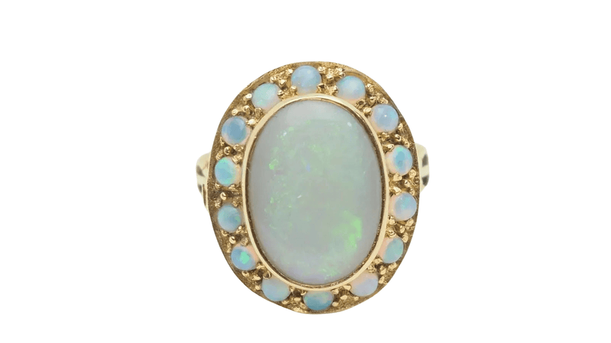 Bague 48 Bague ancienne en or jaune et cabochon d'opale 58 Facettes 32676