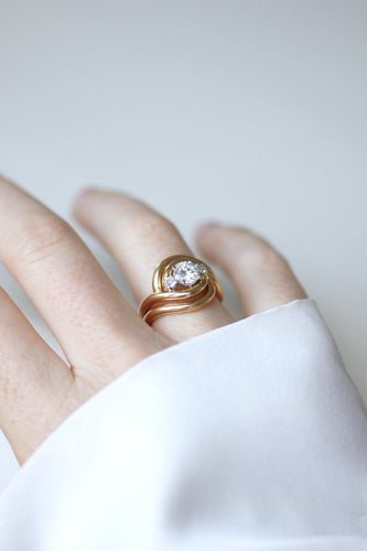 Ring 50 Wirbelring aus 18k Roségold und Platin und Diamanten 58 Facettes