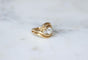 Ring 50 Wirbelring aus 18k Roségold und Platin und Diamanten 58 Facettes