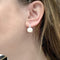 Boucles d'oreilles Pomellato Capri - Boucles d’oreilles en or blanc avec opale et diamants 58 Facettes 35332
