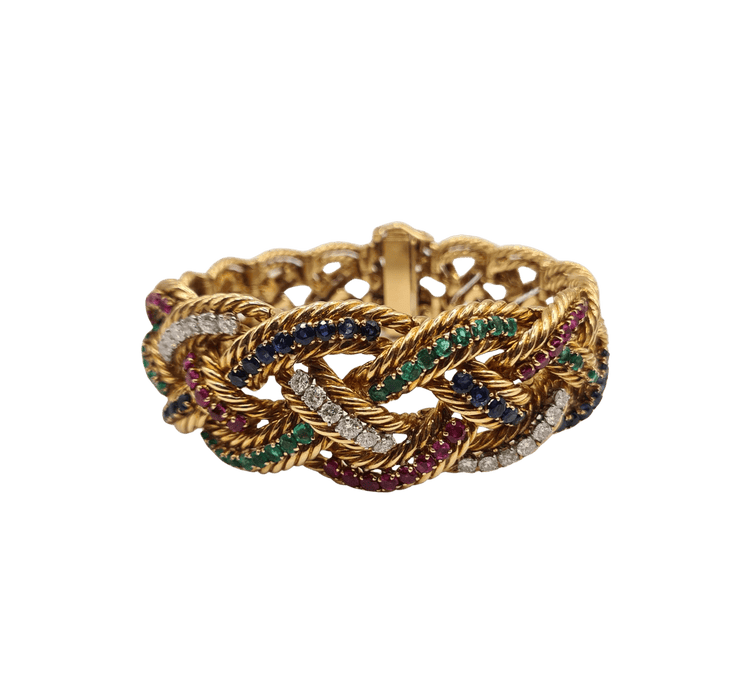 Boucheron - Brazalete de oro amarillo engastado con diamantes, zafiros, esmeraldas y rubíes.