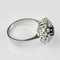 Ring 56,5. Ring i 14K vitt guld med safir 0,60 ct och diamanter 58 Facettes 2189
