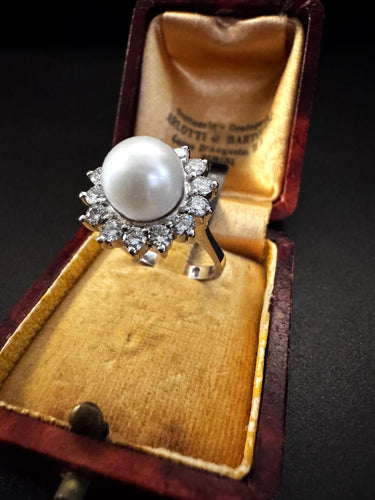 Bague 54 Bague avec perle et diamants 58 Facettes
