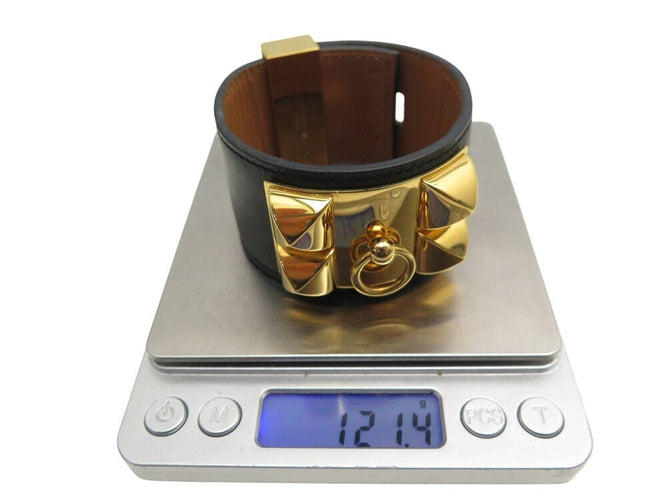 Collier bracelet HERMES collier de chien medor cdc 16cm cuir swift noir metal dore 58 Facettes 268024