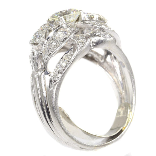 Bague 59 Échos de la mode des années 1950 : bague en platine et diamant 58 Facettes 21174-0487