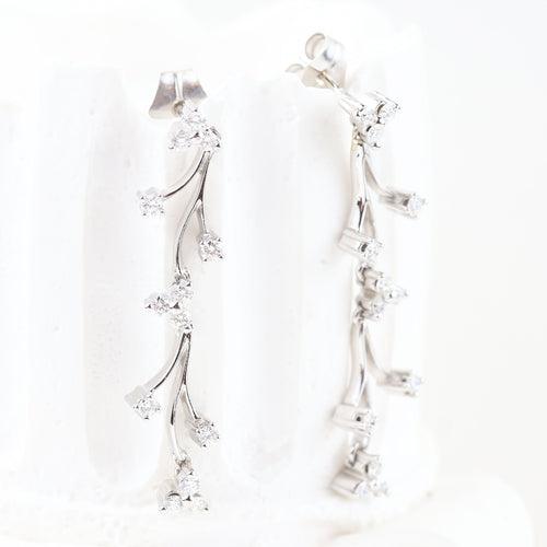 Boucles d'oreilles Boucles d'oreilles en or blanc avec diamants taille brillant 58 Facettes 133721D