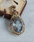 Neo-Victorian style pendant in 14-carat yellow gold and blue spinel 