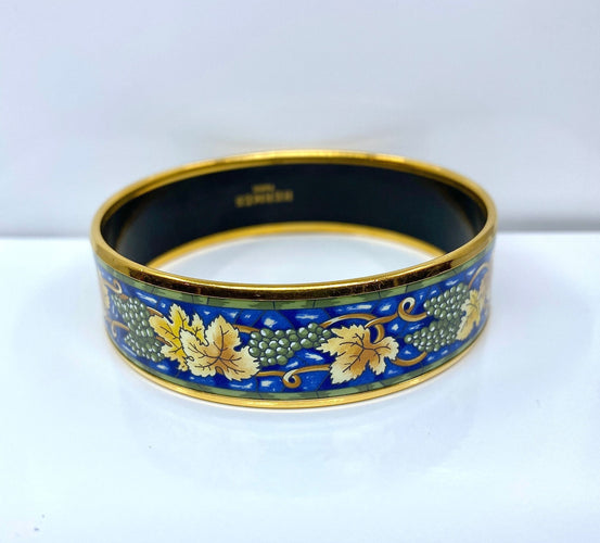 Bracelet HERMÈS - bracelet en métal doré et émail 58 Facettes AB657