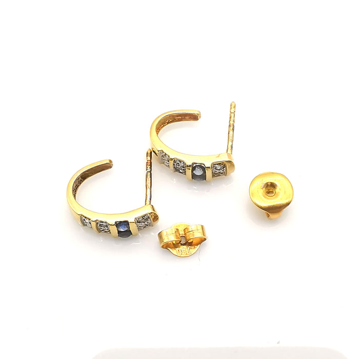 Gouden oorbellen met diamanten en saffieren