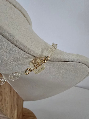 Collier Chanel - Collier Ice Cube vintage en métal doré et résine 58 Facettes