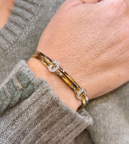 Bracelet Bracelet Cartier vintage double C en or et diamants 58 Facettes