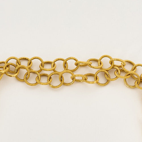 Collier Sautoir en or jaune à maillons ronds entrelacés 58 Facettes CLA0761