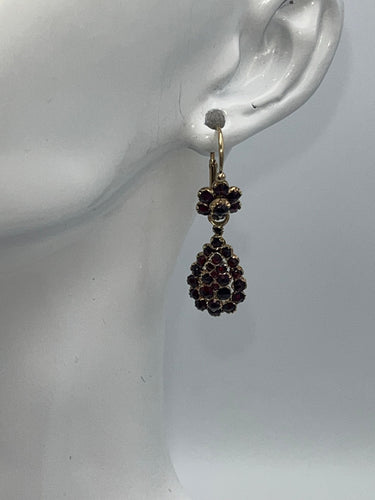 Boucles d'oreilles Boucles d'oreilles dormeuses or jaune grenats 58 Facettes 149057401