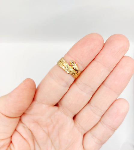 Bague 54.5 Bague serpent or rose finement tressée yeux rubis 58 Facettes A04370