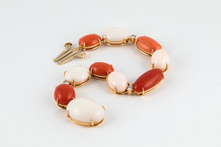 Bracelet Bracelet corail rouge et rose pale 58 Facettes 175328