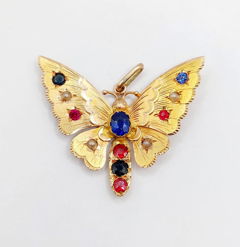 Pendentif Pendentif or rose papillon, pierres de couleur et perles 58 Facettes A05324
