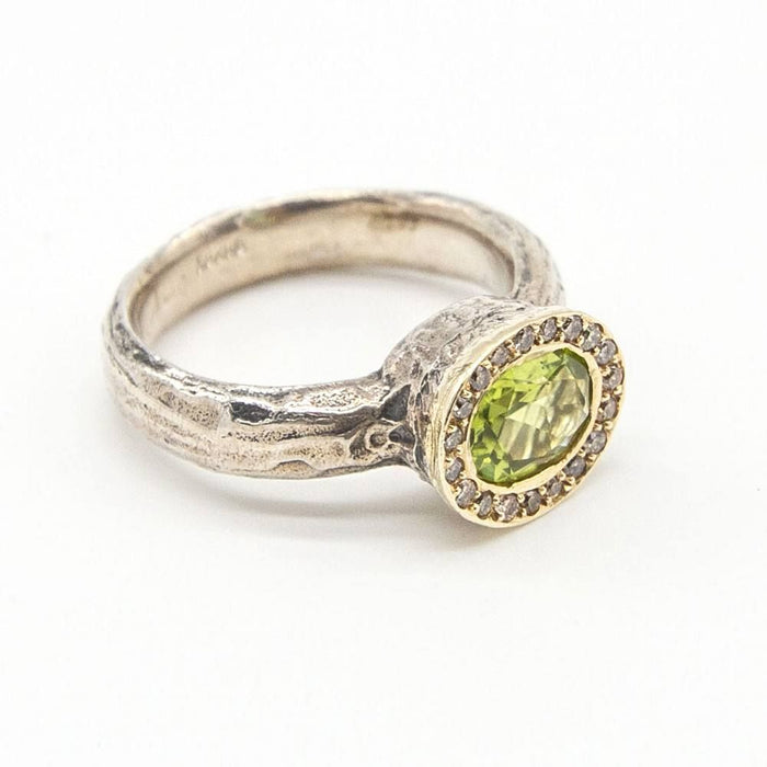 Silber- und Goldring mit Diamanten und Peridot