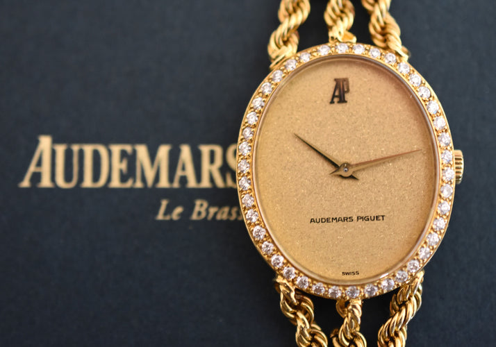 Montre Audemars Piguet - Montre joaillerie femme or jaune & diamants, 1981 58 Facettes AP-100