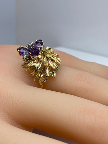 Boucles d'oreilles 50 Bague et boucles d’oreilles en or 18 carats, améthystes et diamants 58 Facettes AB506