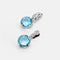 BULGARI - Boucles d'oreilles Parentesi Cocktail topaze bleue 58 Facettes