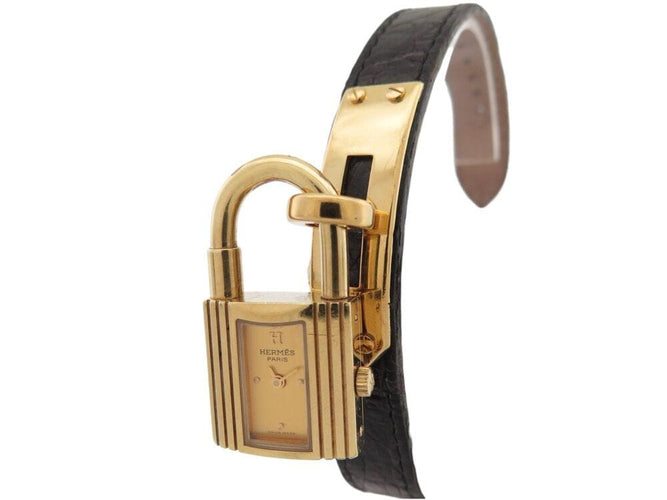 Montre montre vintage HERMES Kelly Mini Cadenas 20 mm plaque or quartz dame 58 Facettes 268902