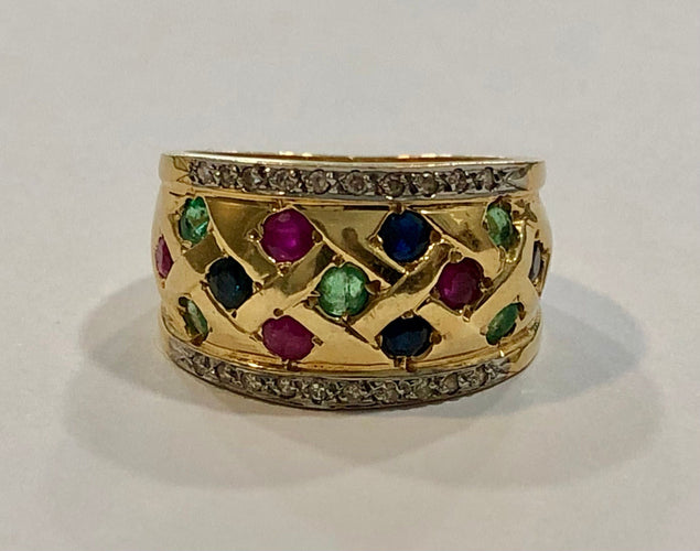 Bague 52 Bague or jaune, saphirs, rubis, émeraude, diamants 58 Facettes