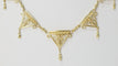 Collier Collier draperie du XIXe siècle en or jaune 58 Facettes 31763