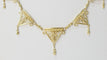 Collier Collier draperie du XIXe siècle en or jaune 58 Facettes 31763