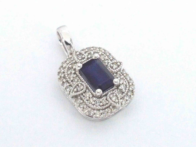 Pendentif Pendentif en or blanc avec diamants et saphir 58 Facettes 2350