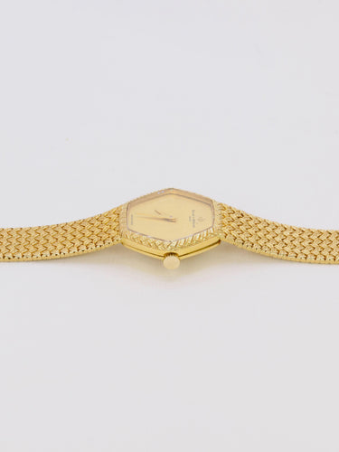 Montre BAUME & MERCIER - Montre vintage or jaune maille tressée 58 Facettes 1067.3