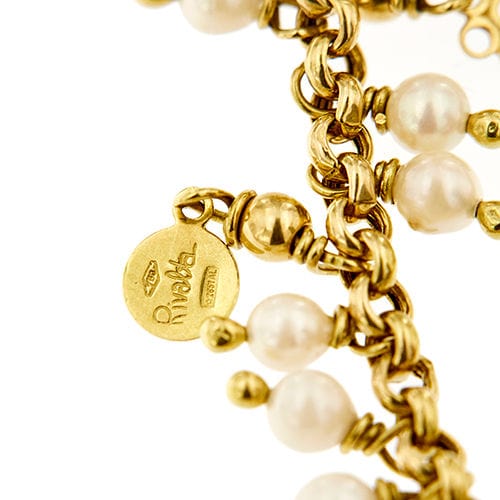 Collier Collier avec fleur en émail et breloques 58 Facettes 37280