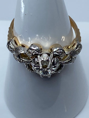 Bandad armring i vitguld och diamant