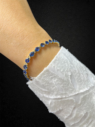 Bracelet Bracelet tennis en or jaune avec saphirs et diamants 58 Facettes