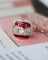Bague 47 Bague Dôme Or Rose Diamants et Calibrés de Rubis Verneuil 58 Facettes A11310