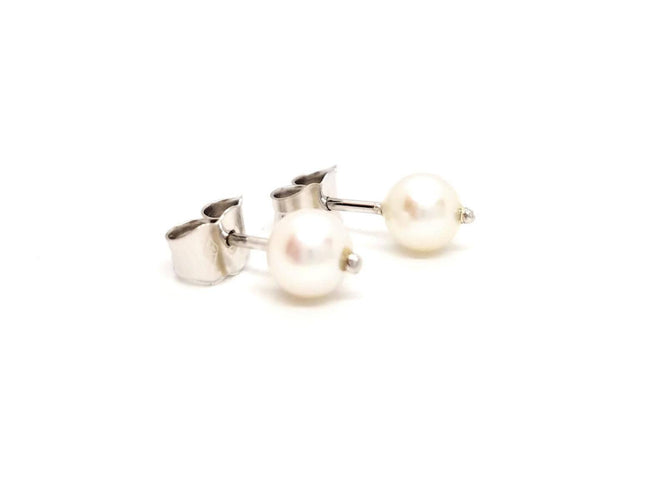 Boucles d'oreilles Boucles d'oreilles Puces Or blanc Perle 58 Facettes 812401CD