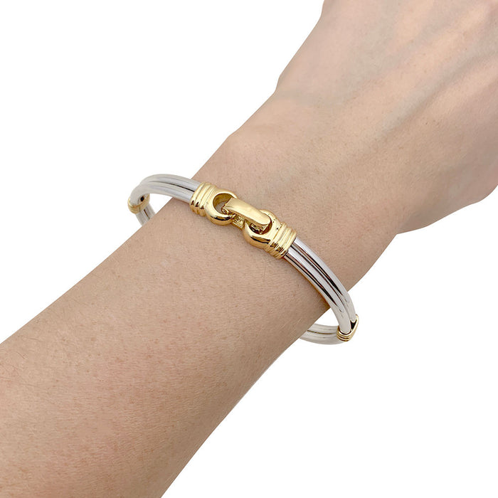 Gold and steel bracelet.