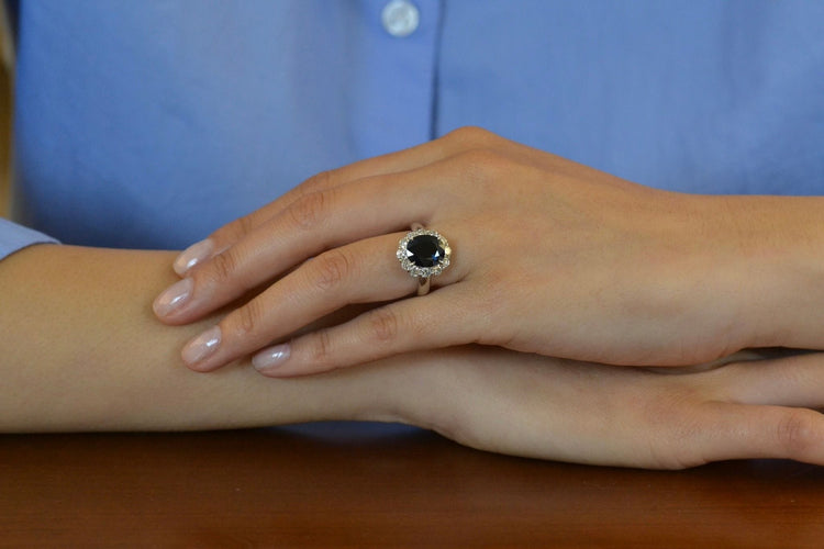 Bague vintage saphir et diamants en platine 58 Facettes 27489dv