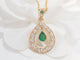 Collier Collier pendentif en or jaune, émeraude et diamants 58 Facettes 33327