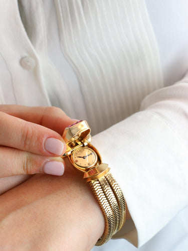 Montre UTI - Montre à secret tubogas or jaune diamants rubis calibrés 58 Facettes 1153.5