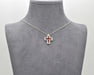 Collier Collier croix avec rubis et diamants 58 Facettes