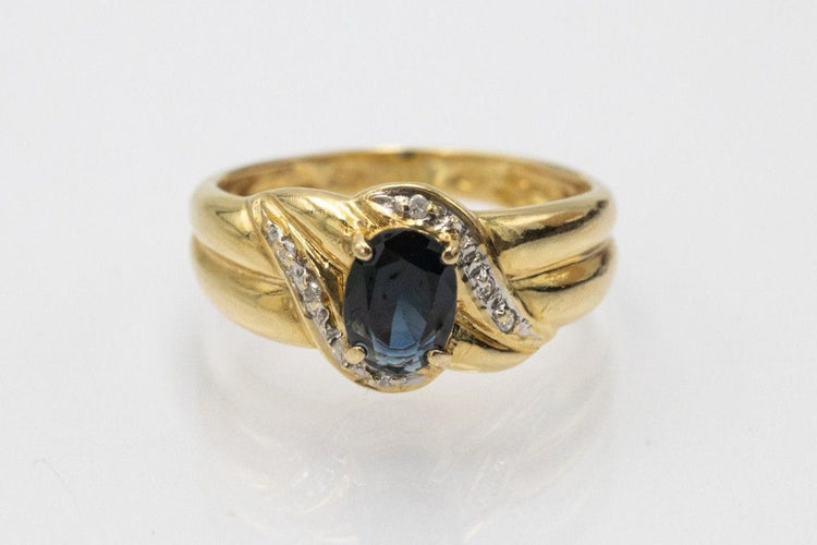 Bague Bague vintage française en or avec saphir et diamants. 58 Facettes 11258